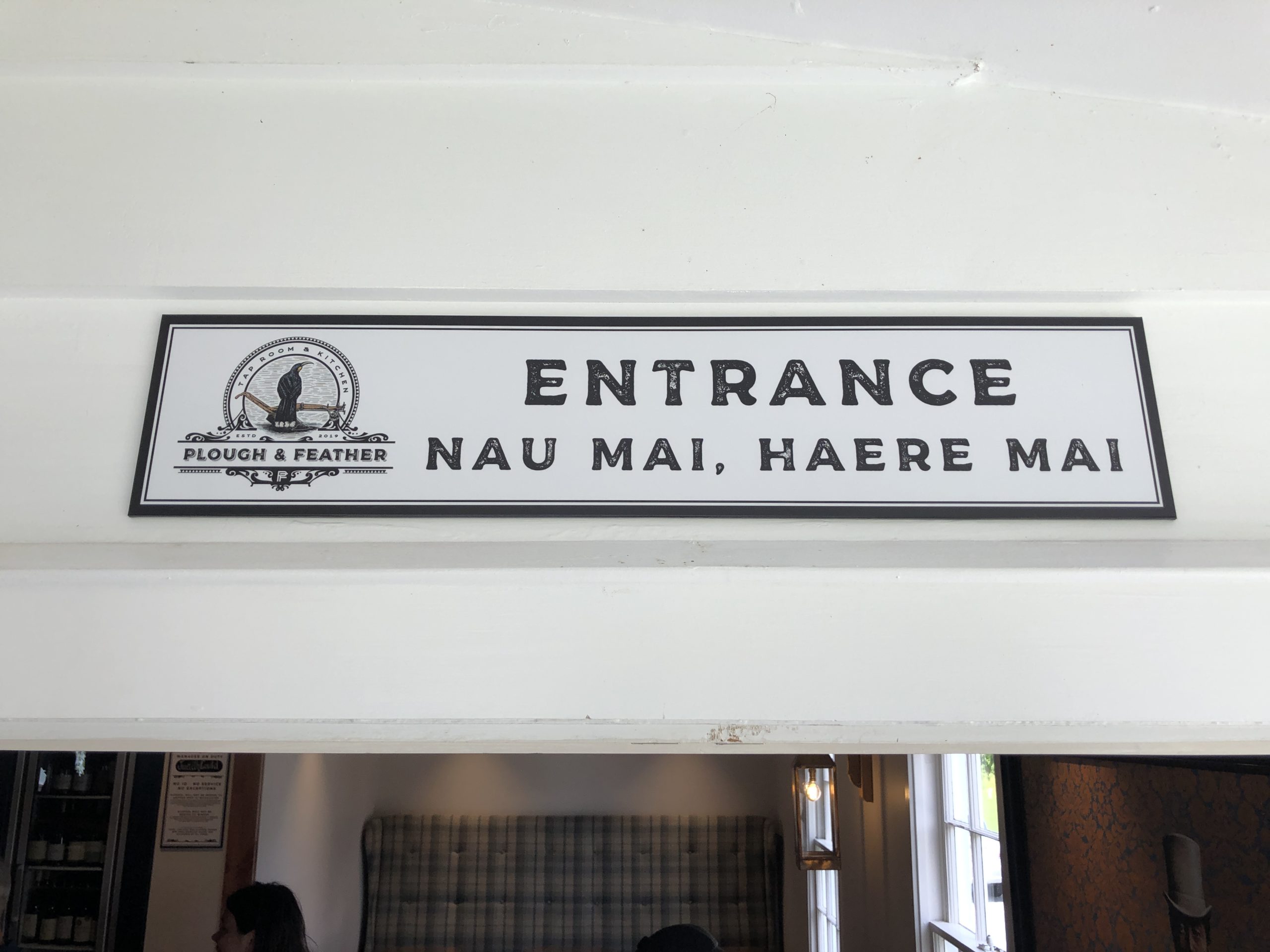 Naui mai haere mai sign